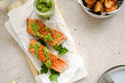 Grilled salmon with herb sauce